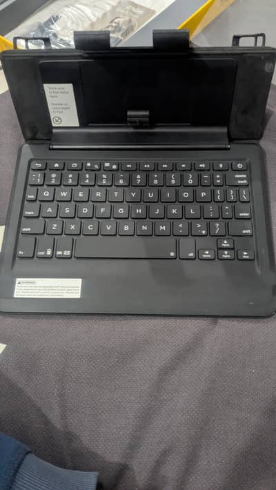 zagg slim Bluetooth keyboard with box and charger