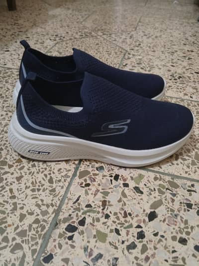 Navy blue sneakers