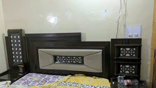 A heavy looking bed complete room furniture set