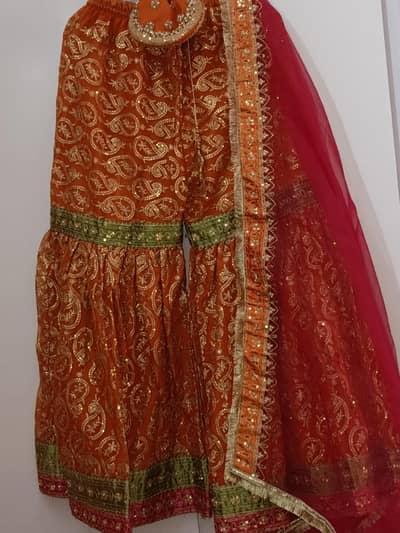 Mehandi dress with potli