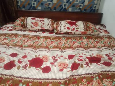 wooden king bed with mattress