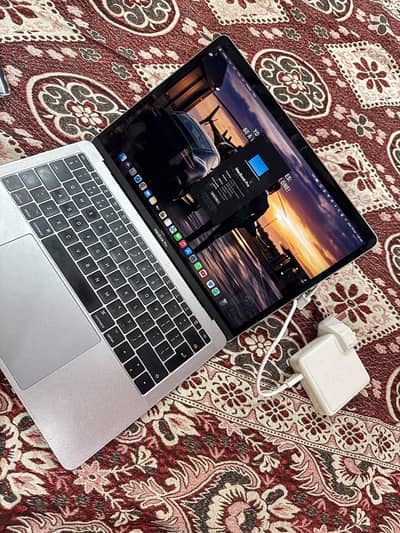 MacBook 2017 Pro with charger Neet and clean Good condition
