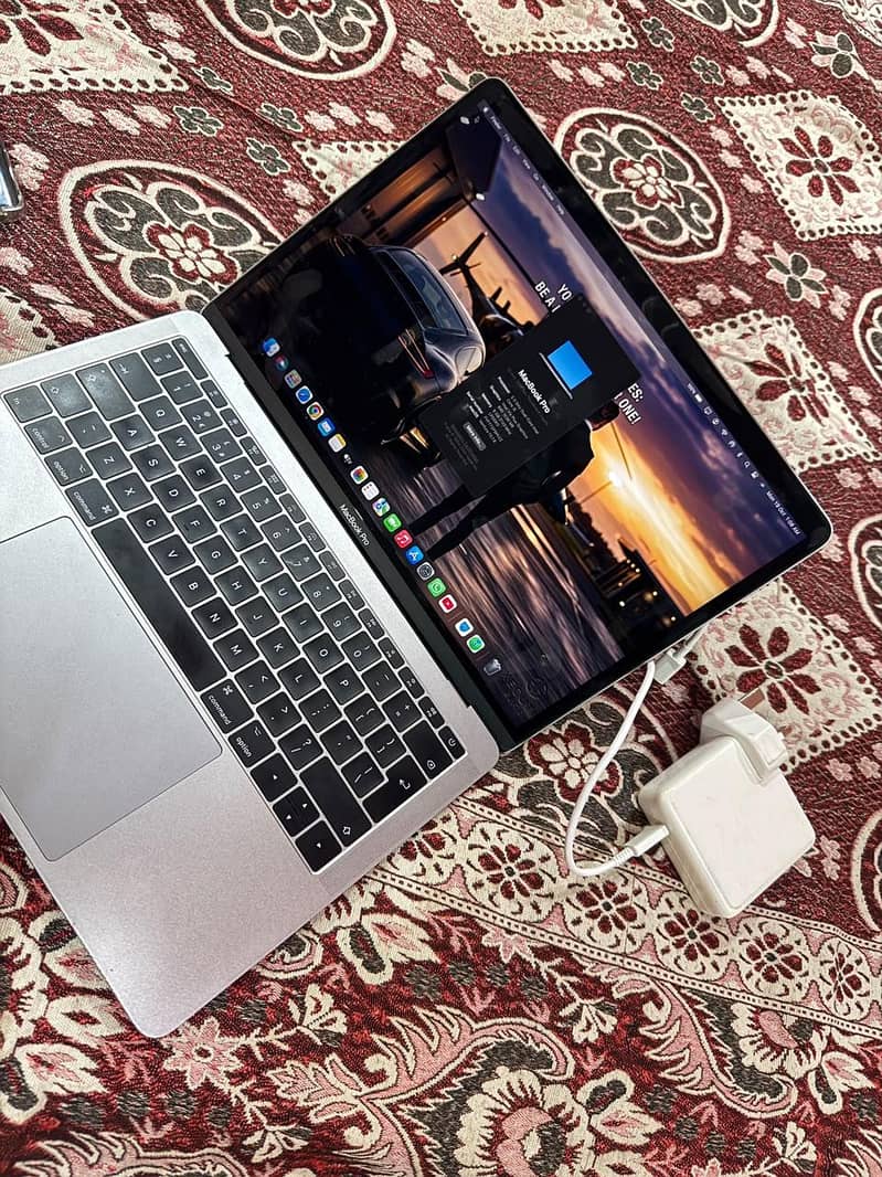 MacBook 2017 Pro with charger Neet and clean Good condition 0