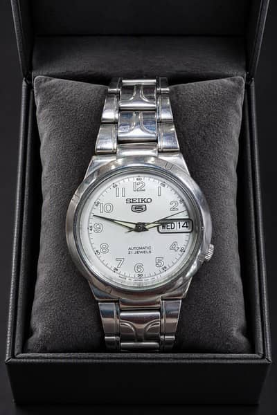 Seiko 5 automatic glass back watch