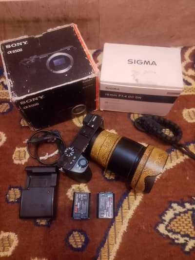 Sony a6500 body sigma 16mm1.4 art boxes