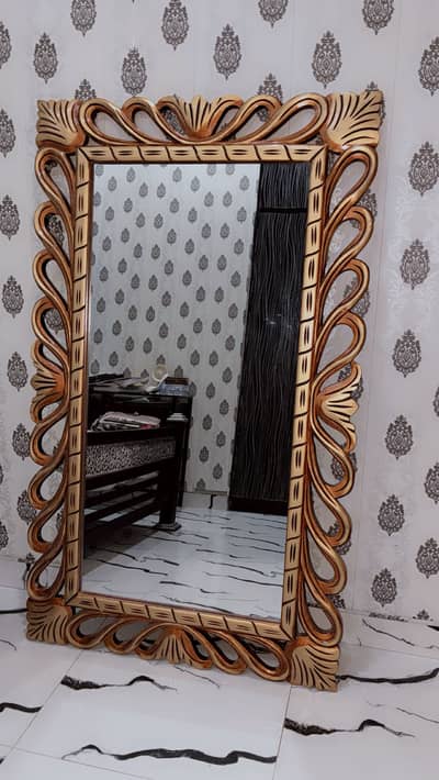 Mirror in wooden frame with deco paint