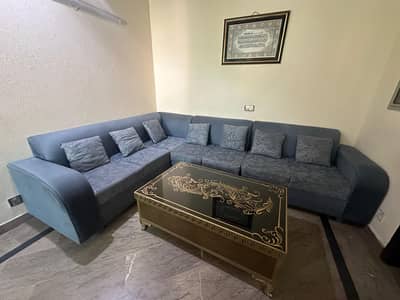 L Shape Sofa with Center table.