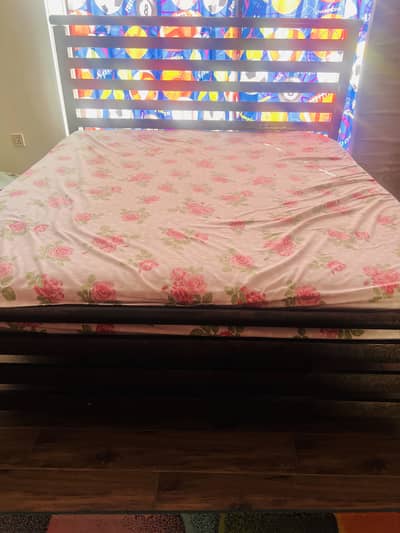 Iron bed with mattress