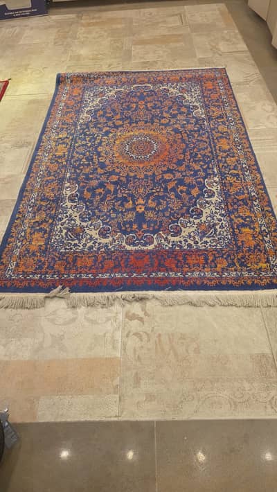 Royal blue and orange carpet/rug