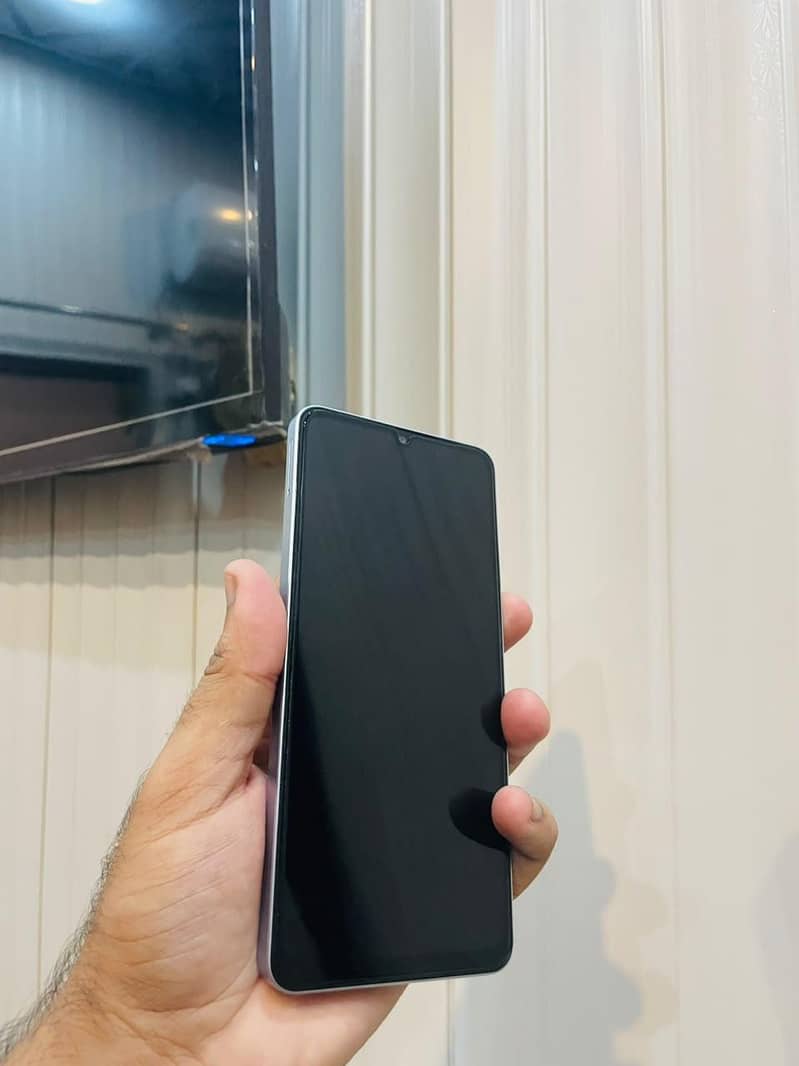 Samsung Mobile A06 3