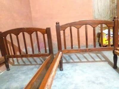 02 WOODEN SINGLE BEDS AVAILABLE FOR SELL