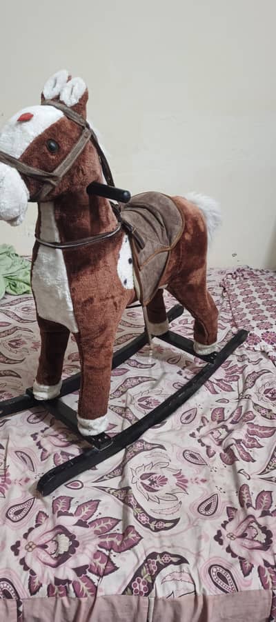 Children rocking horse witj wheels in Brown and White Toddler Riding