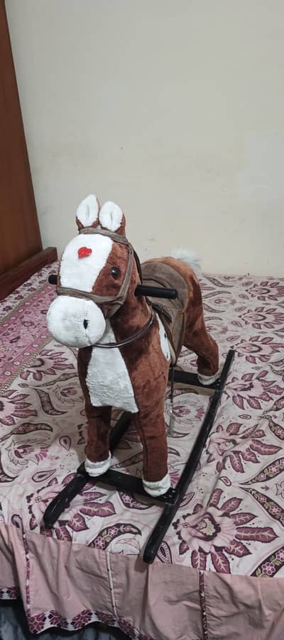 Children rocking horse. White Toddler Riding used