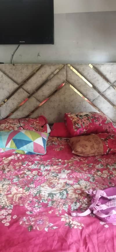 wooden cushion bed