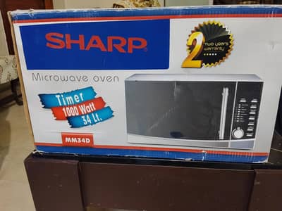 Brand new sharp 34liter microwave oven 1000watt