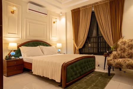 Daily Basis Apartment & Rooms Per day Perweek Short stay Available in E-11 Islamabad