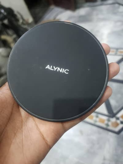 Wireless charger  Blkl new ha  Orangiiitownn 10  0312 ,,,23,46,568
