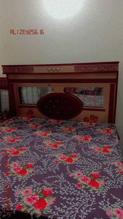 Golden color double bed