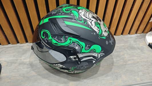 Vector Helmet for Sale – Black & Green Graphic Design