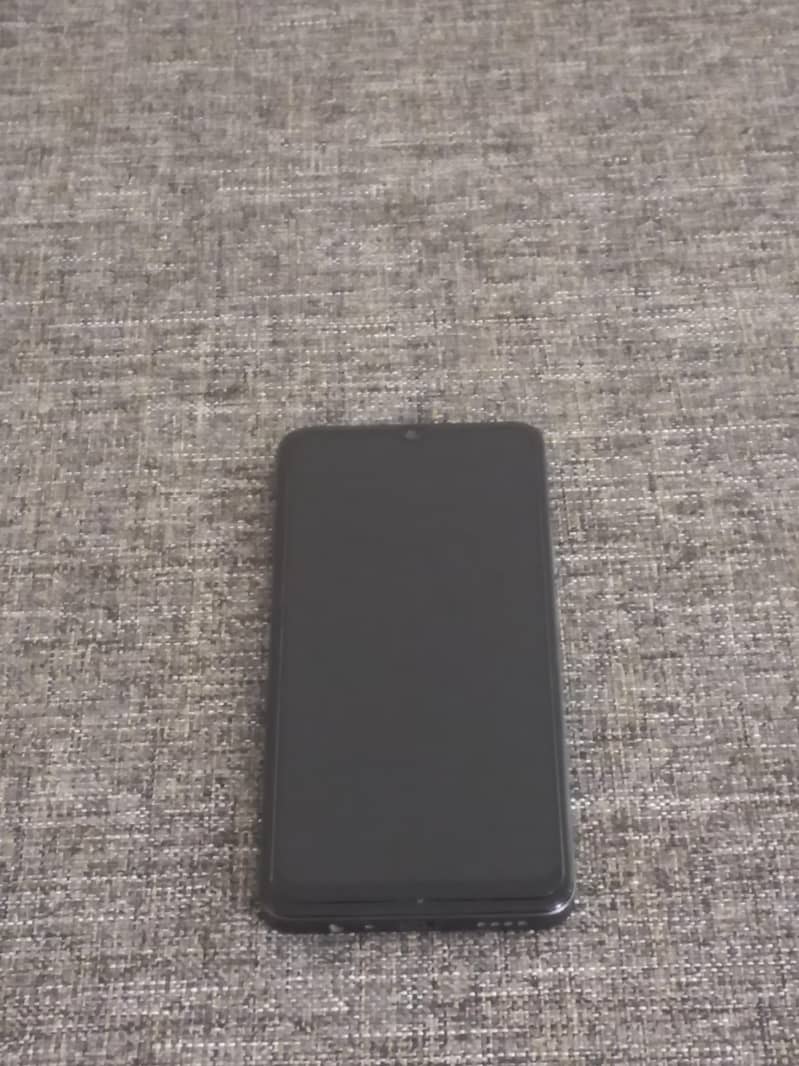 Realme Note 60x 4