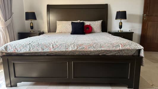 Wooden bed without mattress