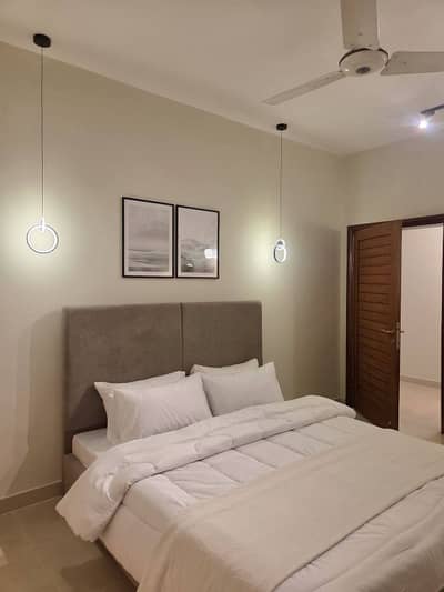 Daily Basis Apartment & Rooms Per day Perweek Short stay Available in E-11 Islamabad