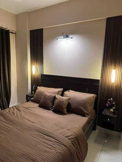 Daily Basis Apartment & Rooms Per day Perweek Short stay Available in E-11 Islamabad