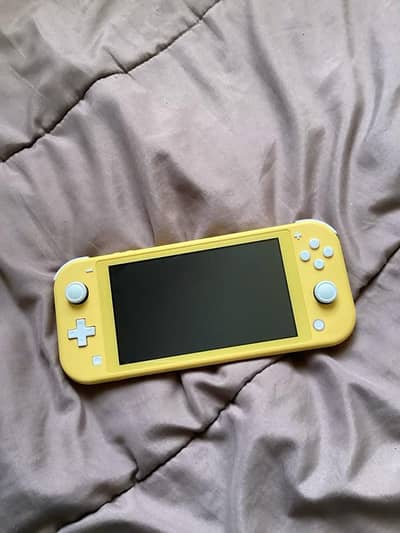 nintendo switch lite with 2 games