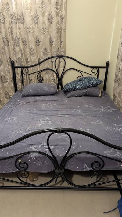 King size iron rod bed