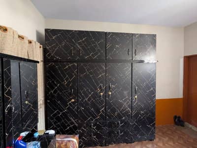 Four compartment wardrobe with two upper compartments