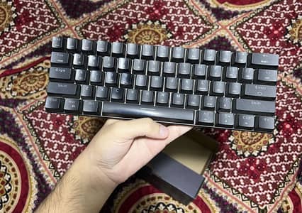 Almost brand new Motospeed Sk62 Gaming Machencal red switches keyboard