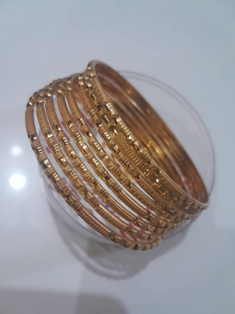 artificial metal bangles. 1