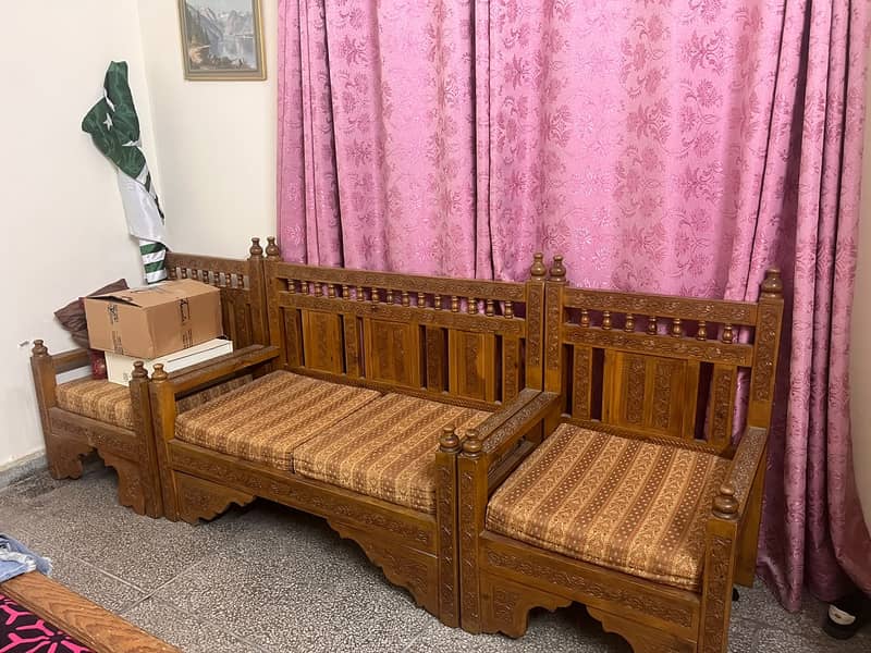 Queen size bed with side table and dressing. 1