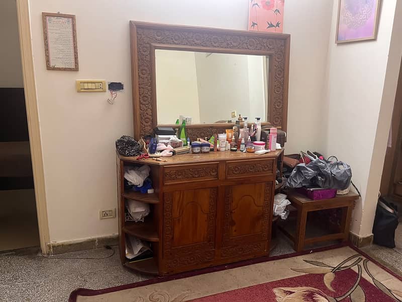 Queen size bed with side table and dressing. 3