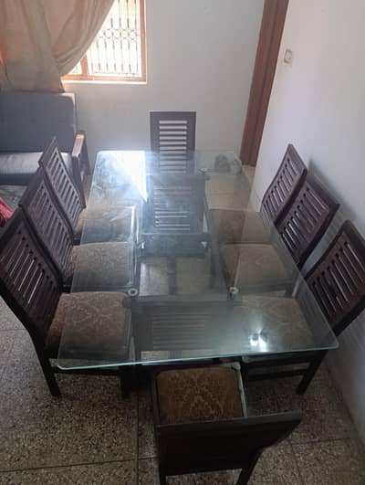 8-Seater Glass Top Dinning Set with Cushioned Chairs - Good Condition