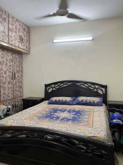 King size bed with 2 side tables and dressing table