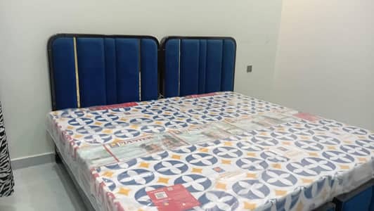 2 single beds with mattress