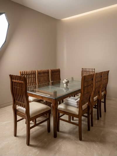 dinning table with wooden chairs