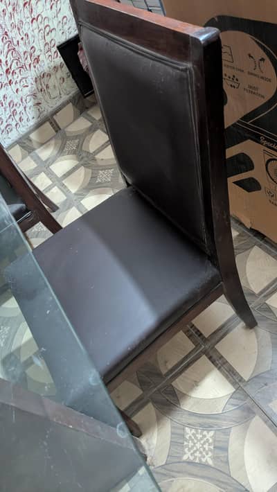 A heavy dining with 6 chairs total original