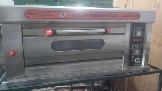 Pizza oven with pans and other