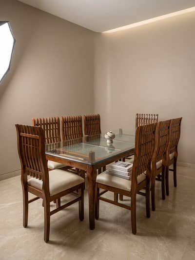 Dining table with 8 wooden chairs