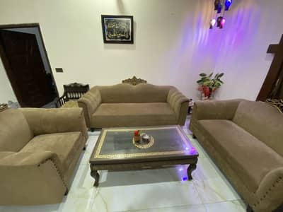6 seater sofa with wooden and glass table