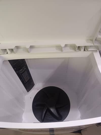 Dawlence DW 7200 WFL Washing machine and Super Asia spinner