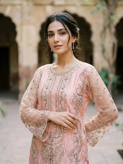 Elegant Peach Pink Embroidered Party Wear Suit with Antique Silver Wor