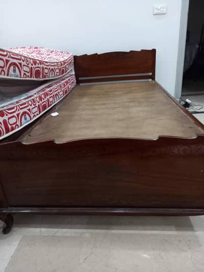 Two single beds with 5 inch mattress in good condition