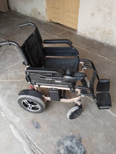 electric wheelchair folding in good condition [WhatsApp only]