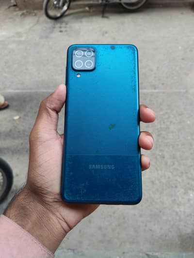 Samsung Mobile A12 4 64 with charger panel original change krwaya ha