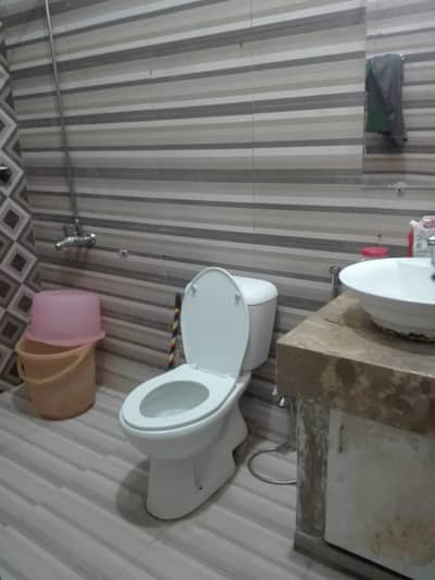 three bed dd tiled flooring ground floor portion for rent in johar