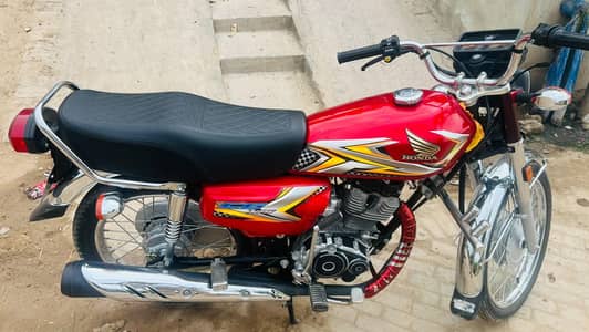 Honda125 Red colour  10by 10. one hand use