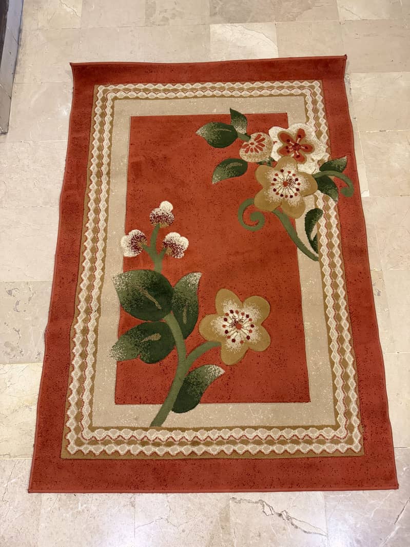 Rust coloured rug 0